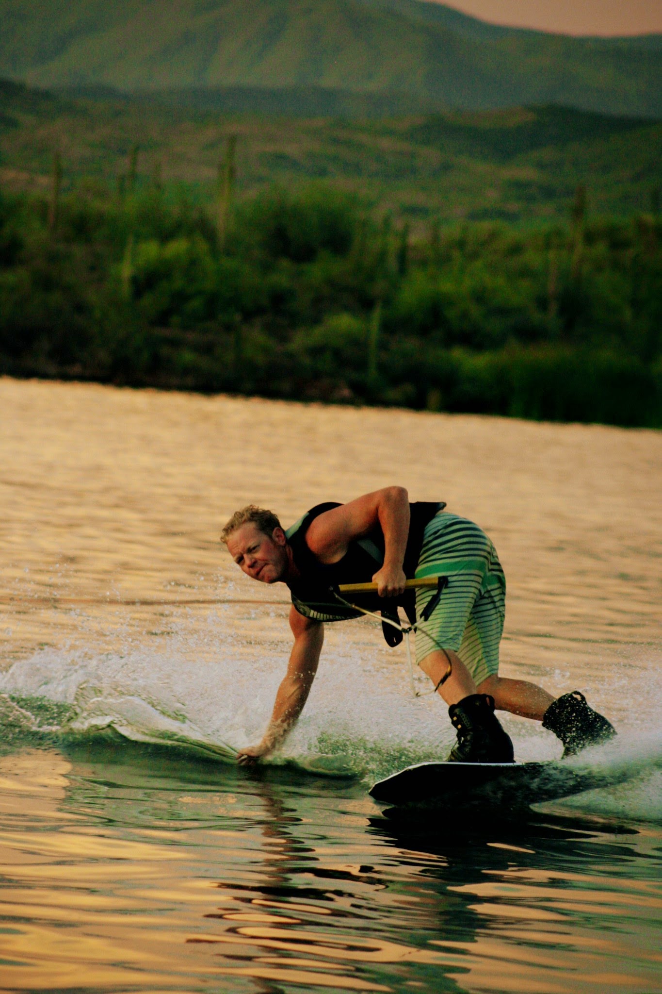 Person wakeboarding on a lake